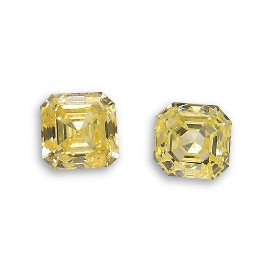 0,35 Karat Fancy Intense Yellow Asscher-Diamanten (SI2) Paar