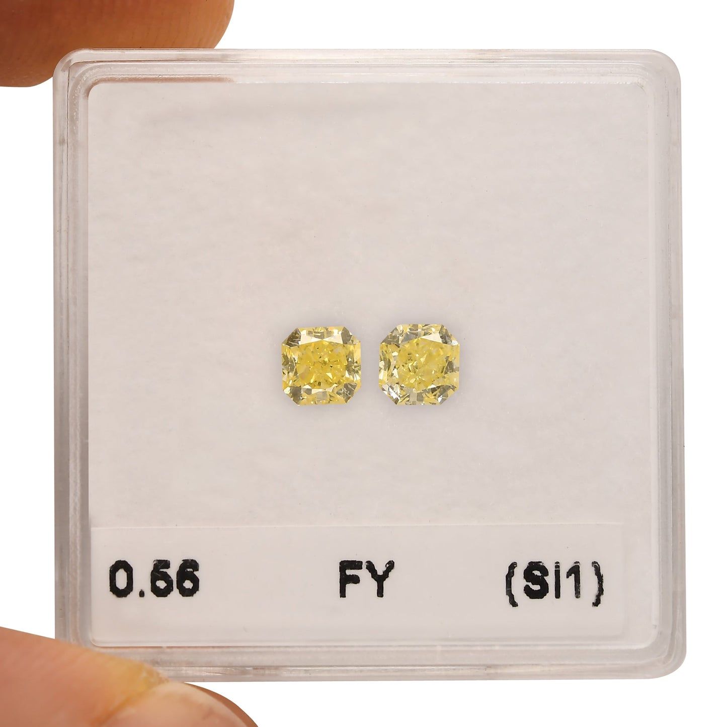 0.56 Carat Fancy Yellow Radiant Diamonds (SI1)