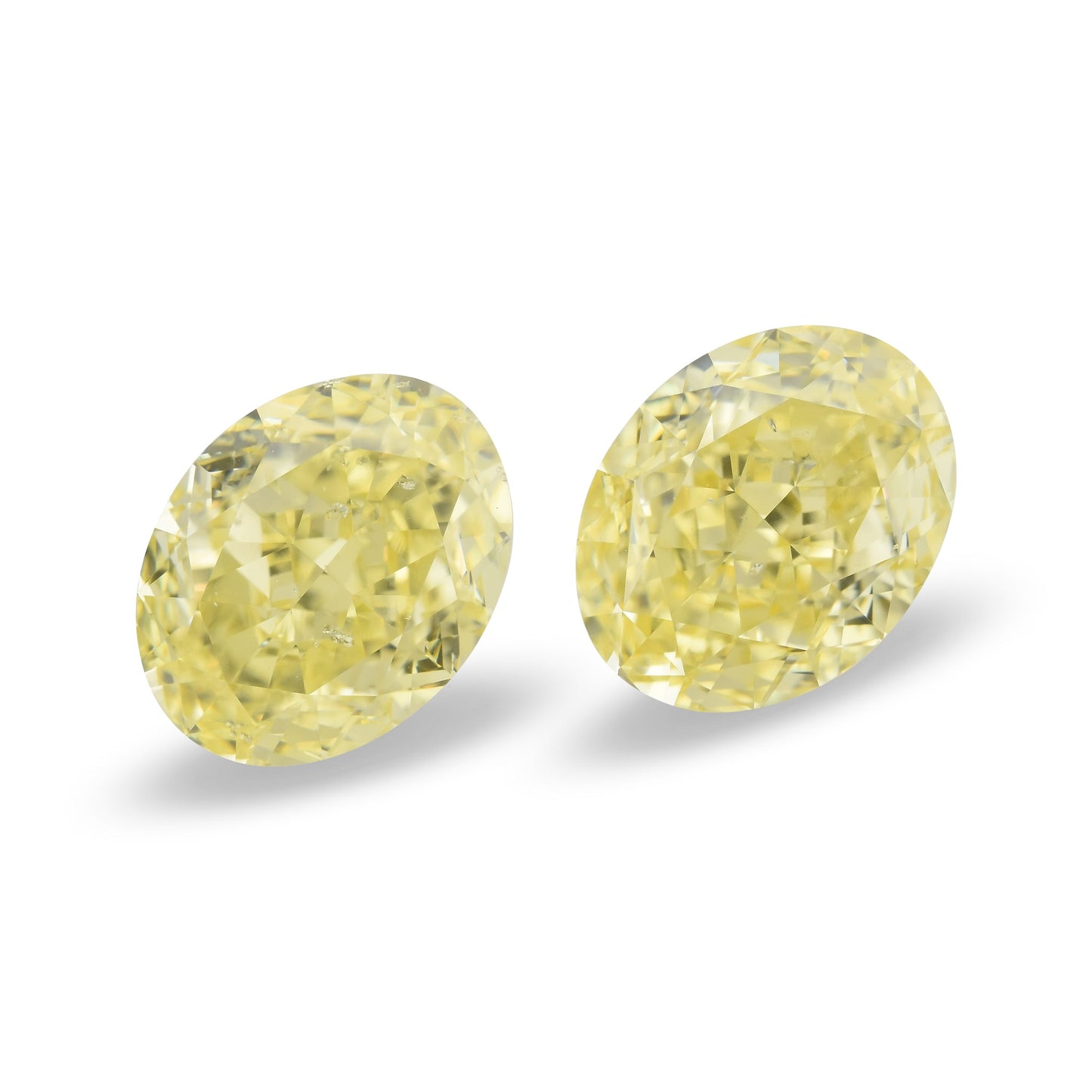 4,24 Karat Fancy Yellow Oval Diamonds SI2