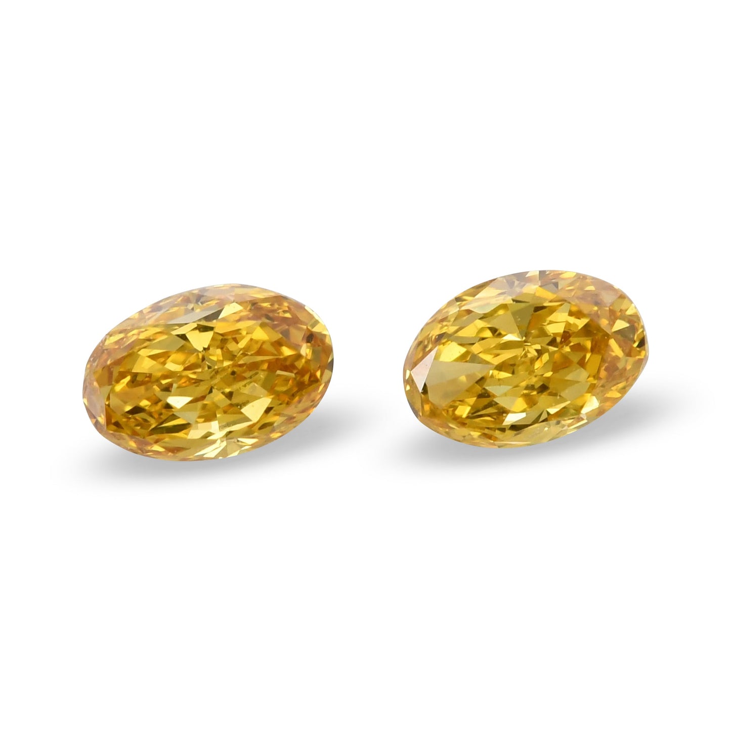 0.43 Carat Fancy Vivid Orangy Yellow Oval Diamonds VS1