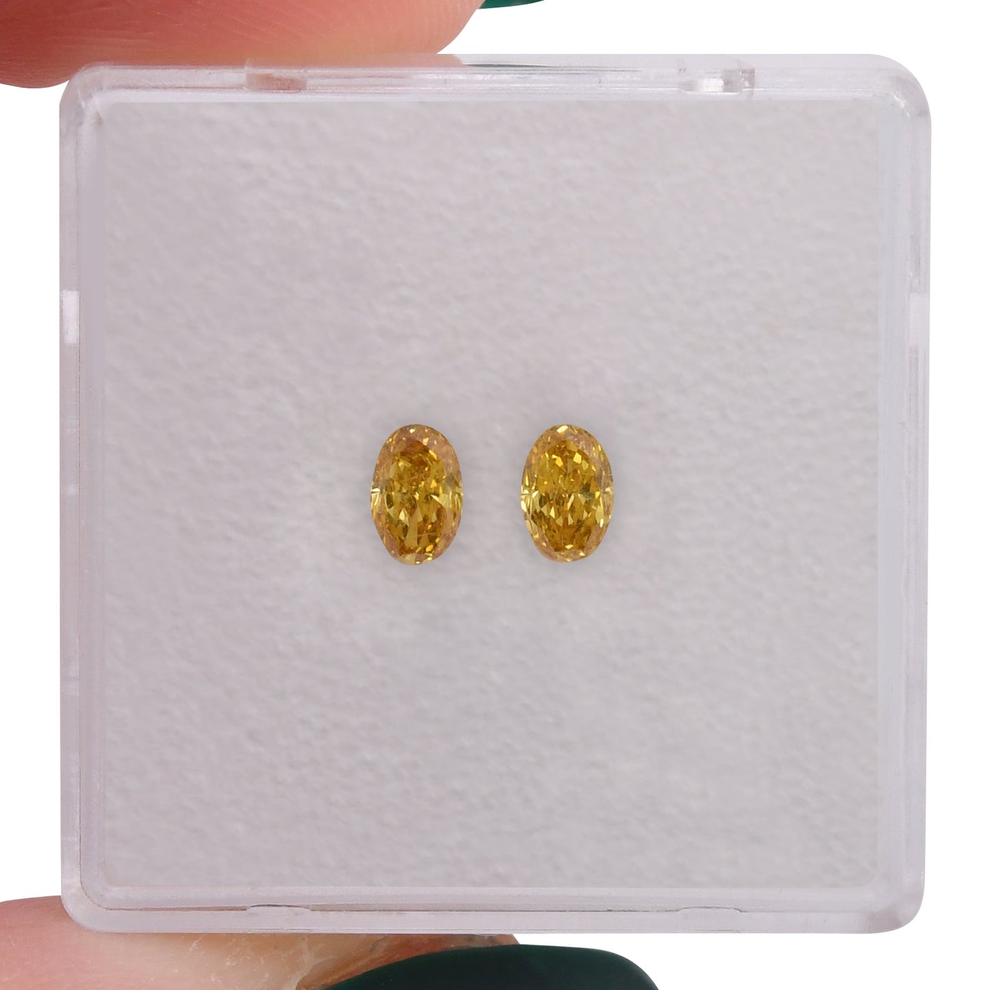 0.43 Carat Fancy Vivid Orangy Yellow Oval Diamonds VS1