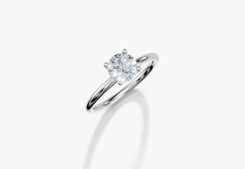 Platinum Round 0.7 Carat E/F VS Plain Plain 4Pr Diamond Ring
