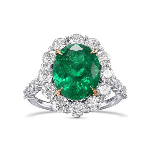 Ovaler Muzo-Ring mit Smaragd und Diamant-Halo