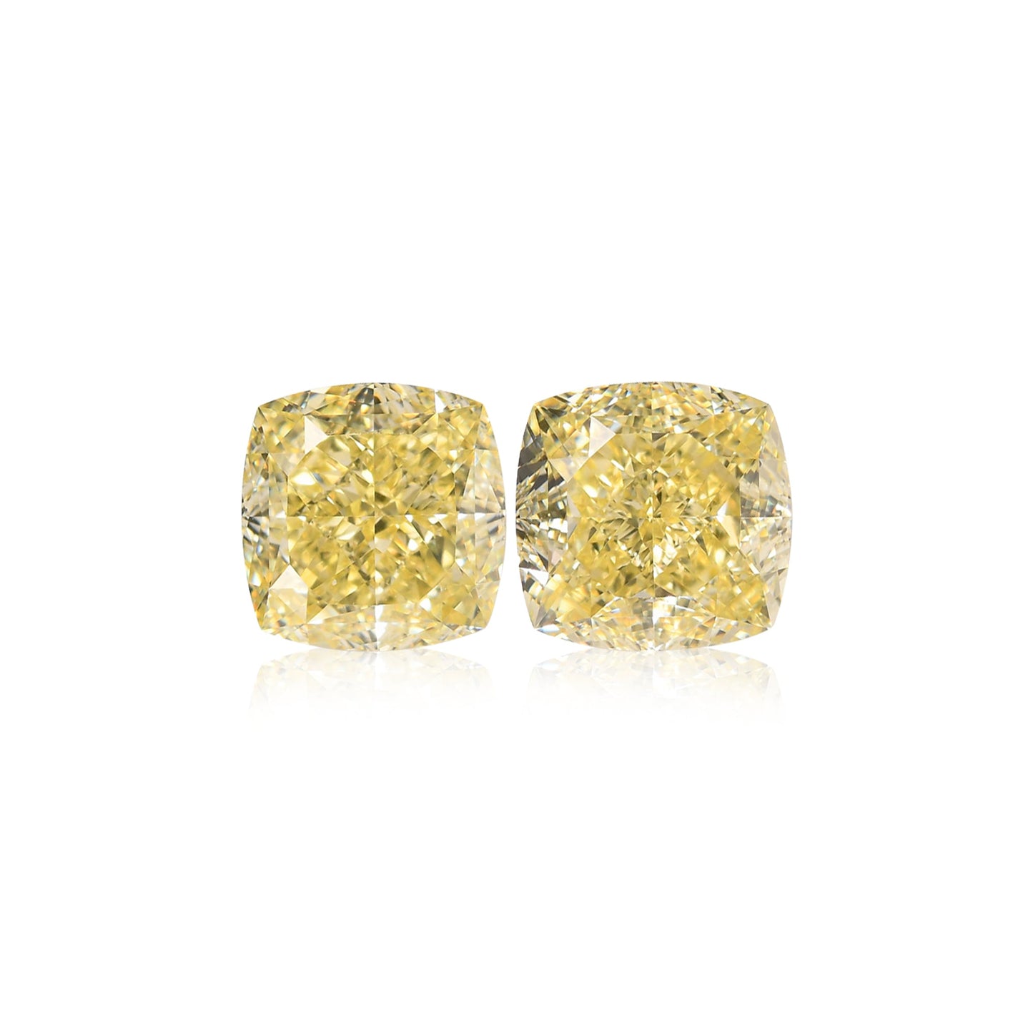 2,17 Karat Fancy Light Yellow Cushion Diamonds VVS1