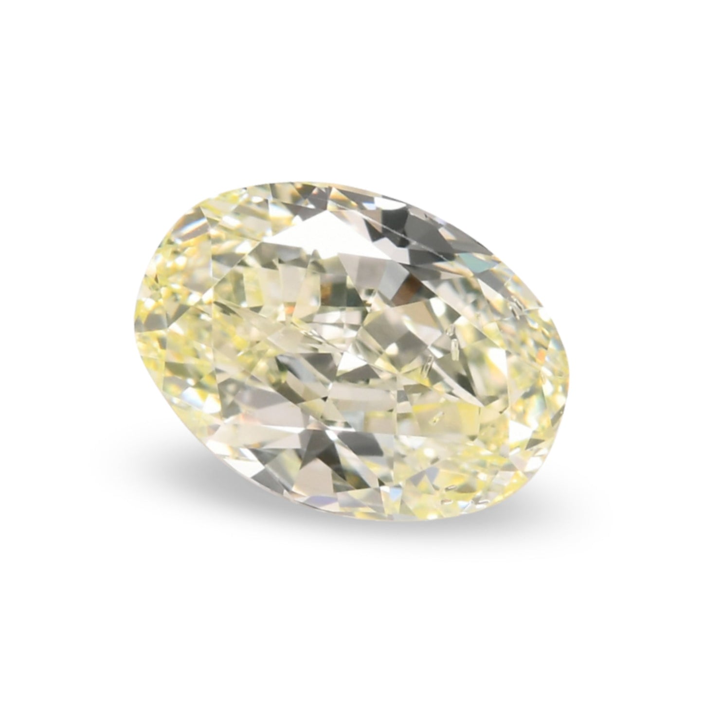0,64 Karat Fancy Light Green Yellow Oval Diamond (SI1) GIA