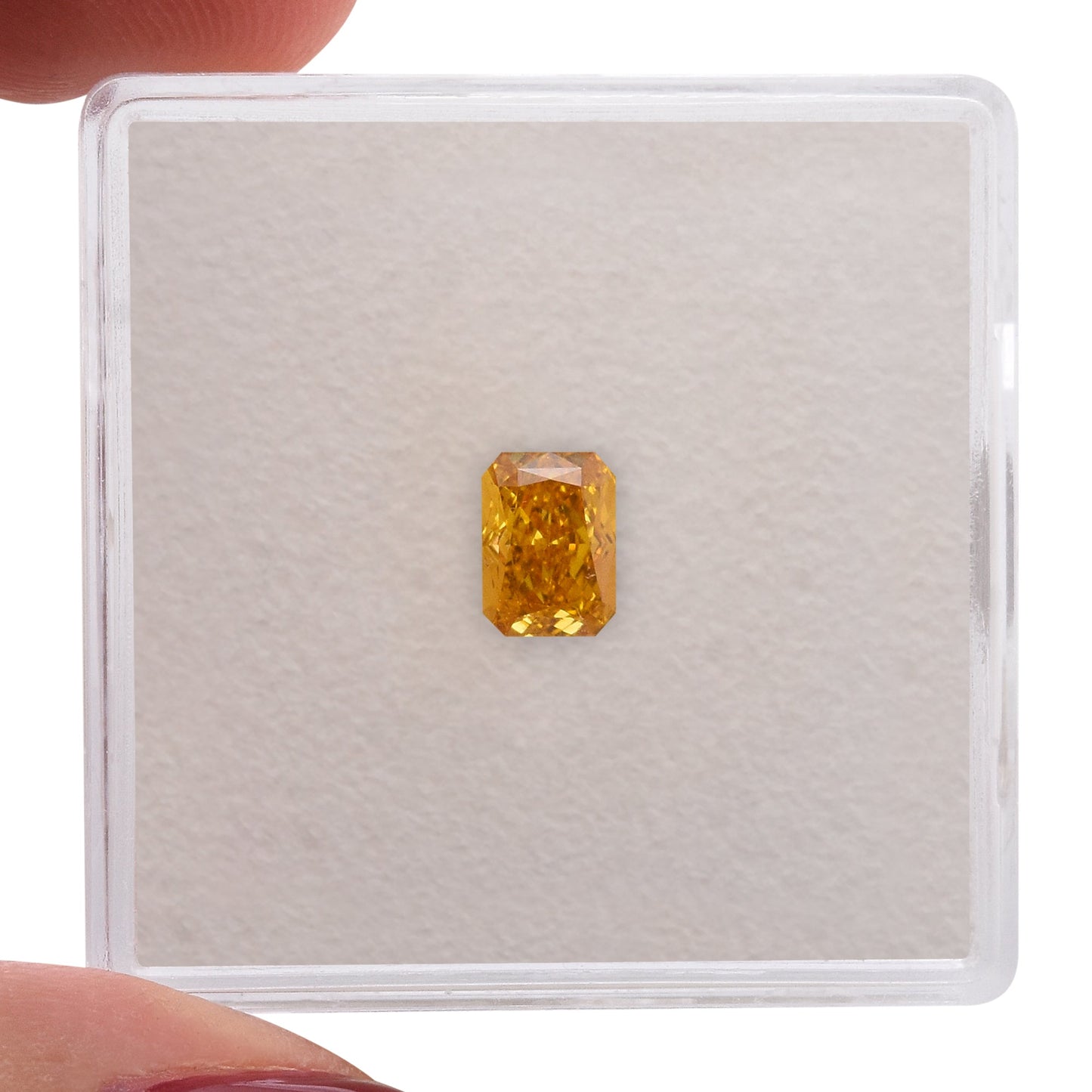0.59 Carat Fancy Vivid Yellow Orange Radiant Diamond VS1 GIA