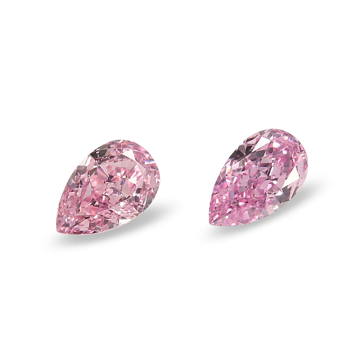 0.16 Carat Fancy Intense Purplish Pink Pear Diamonds (VS)