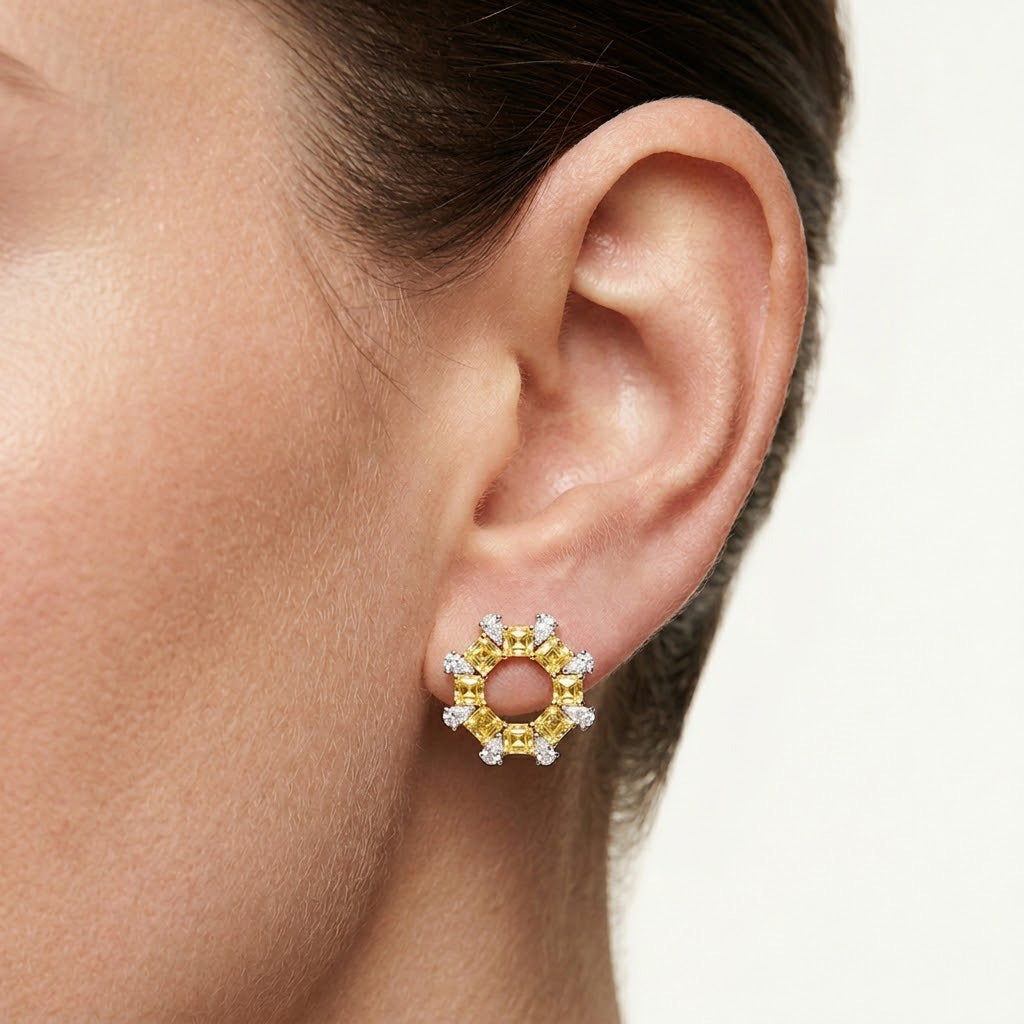 Fancy Intense Yellow Asscher and Pear Diamond Earrings.