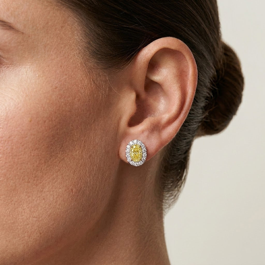 Ausgefallene gelbe ovale Halo-Diamantohrringe