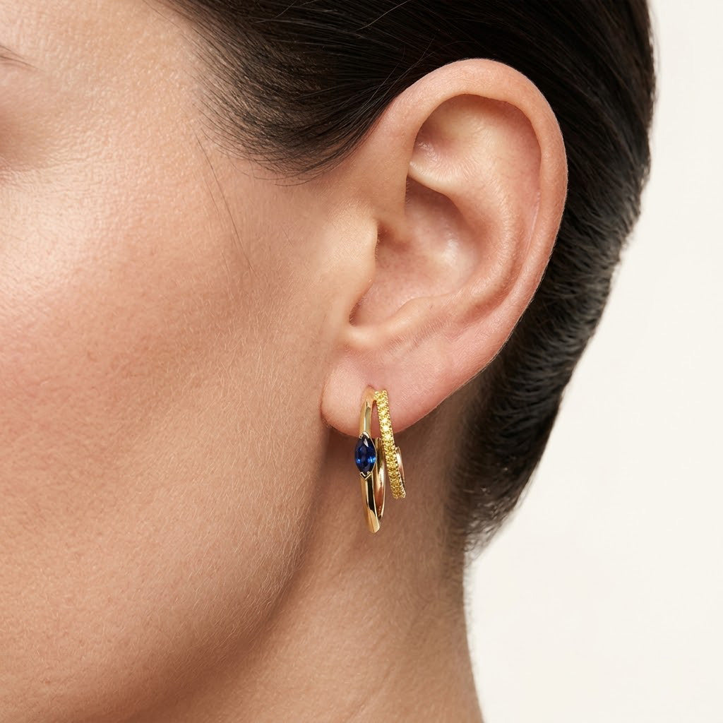 Ohrringe mit Marquise-blauem Saphir und leuchtend gelbem Diamanten