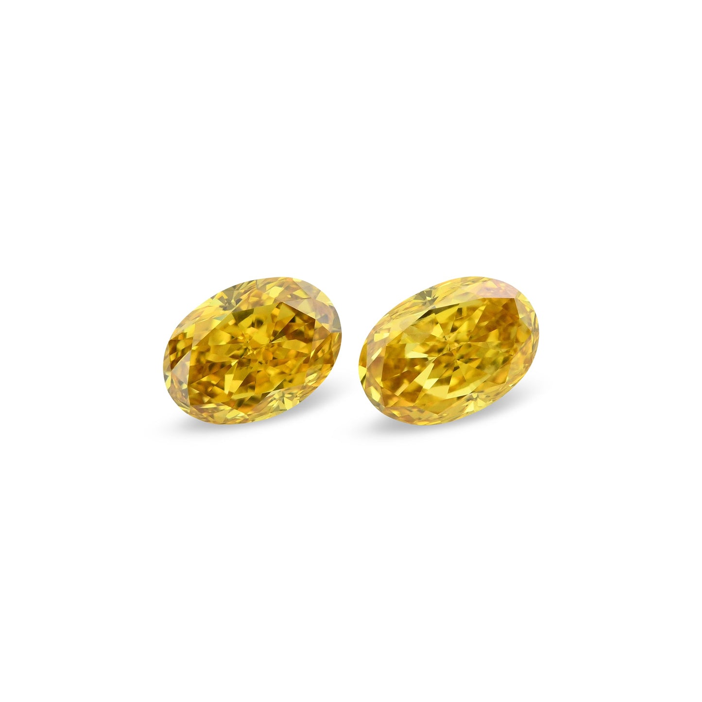 0,87 Karat Fancy Intense Orange Yellow Oval Diamonds (SI1)