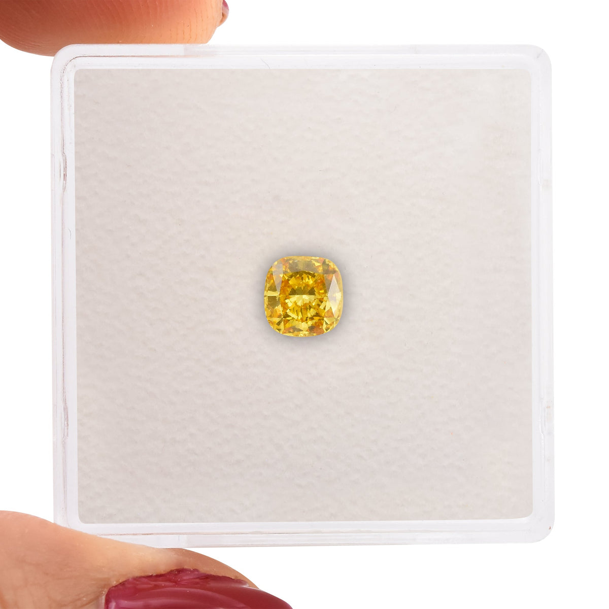 0.41 Carat Fancy Vivid Orangy Yellow Cushion Diamond (SI2) GIA