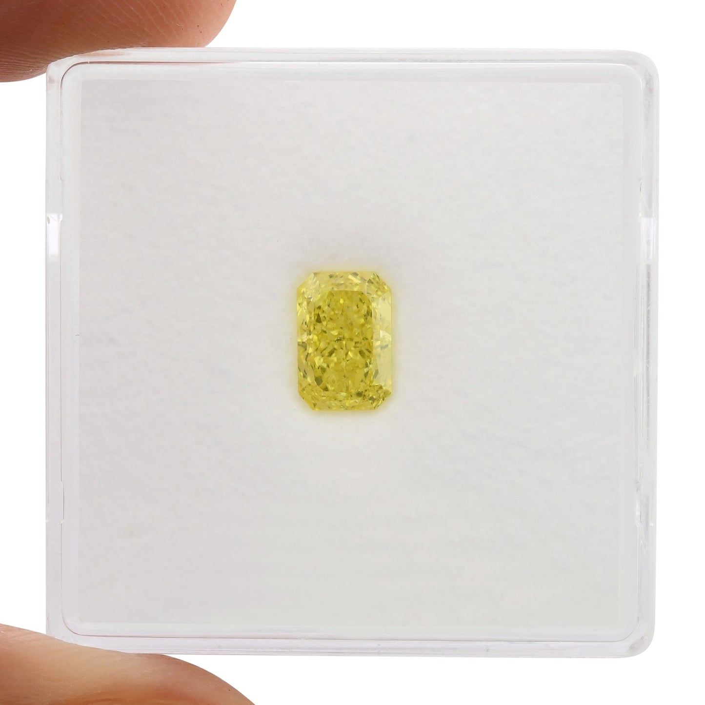 0,79 Karat Fancy Vivid Yellow Radiant Diamant VS1 GIA