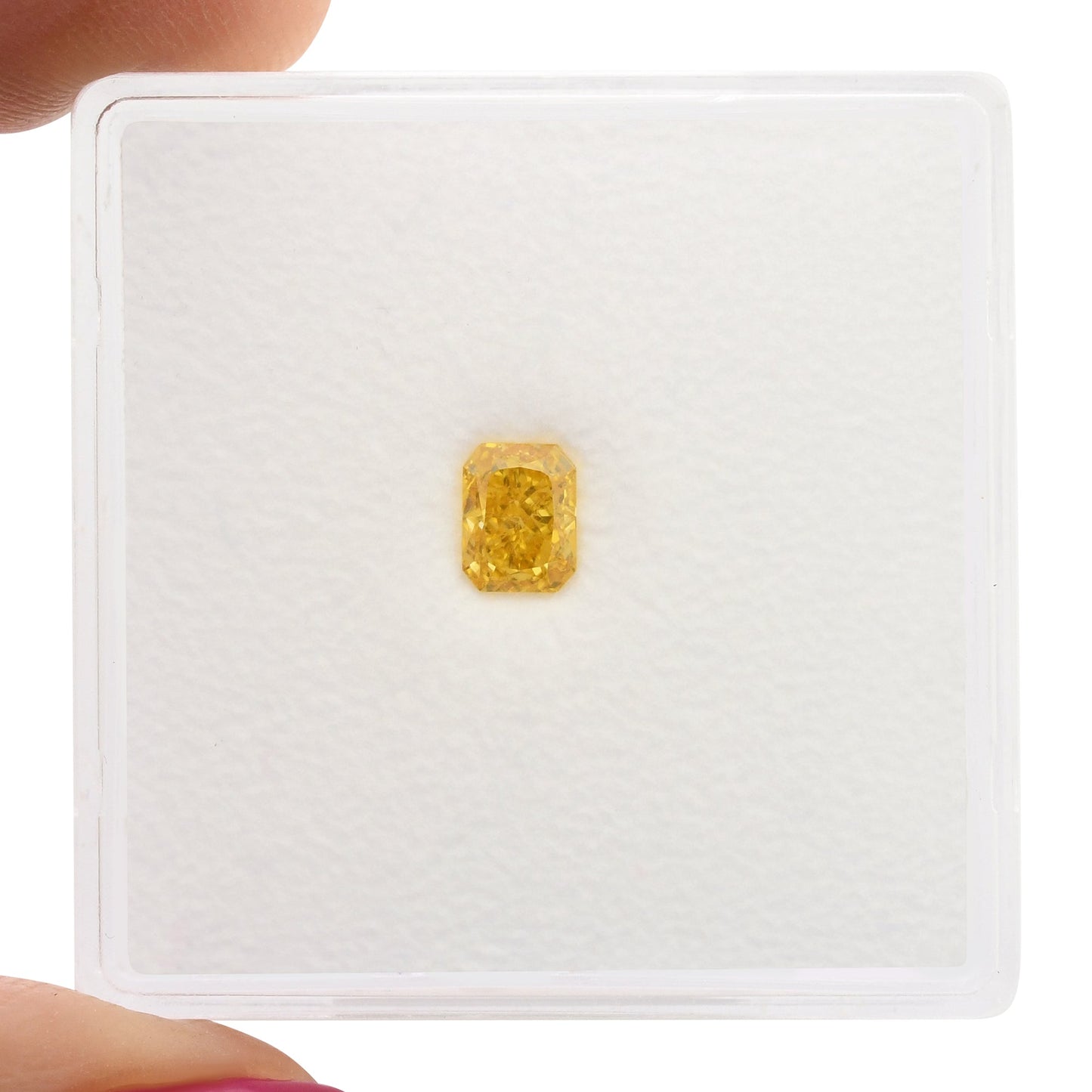 0.33 Carat Fancy Vivid Yellow Orange Radiant Diamond VVS1 GIA