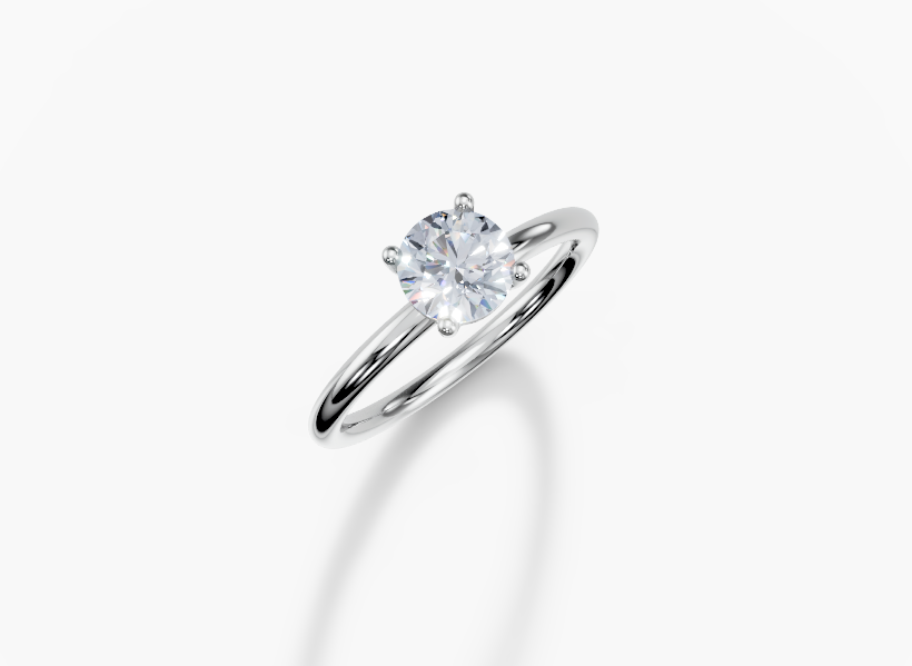 Platinum Round 0.7 Carat E/F VS Plain Plain 4Pr Diamond Ring