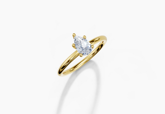 18K Pear 0.3 Carat G/H SI Plain Plain 4Pr Diamond Ring