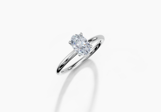 Platinum Oval 0.7 Carat E/F VS Plain Plain 4Pr Diamond Ring