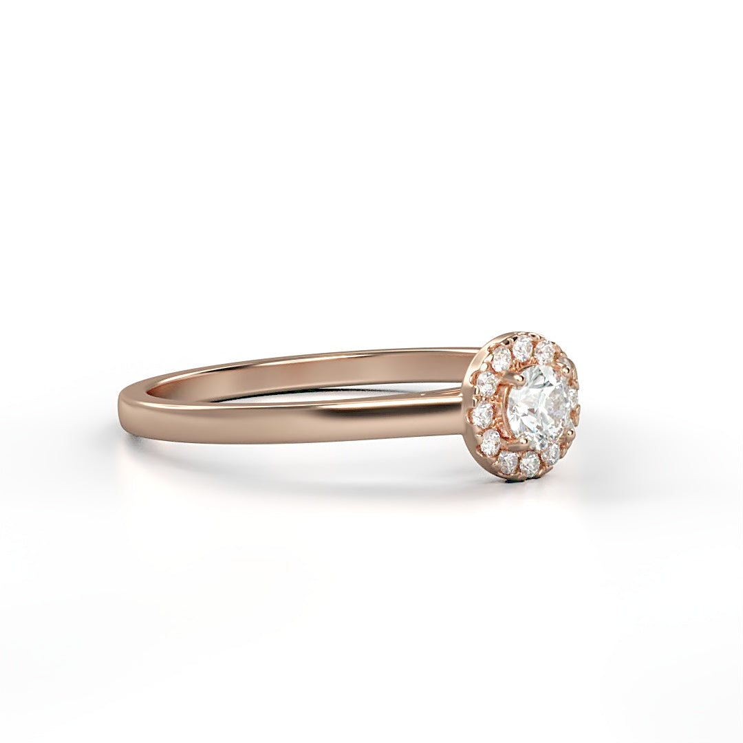 Verlobungsring Amelie mit 0.10 ct W/SI-Diamant, umrahmt von 0.05 ct H/SI-Diamanten im Halo – erhältlich in München und Augsburg

