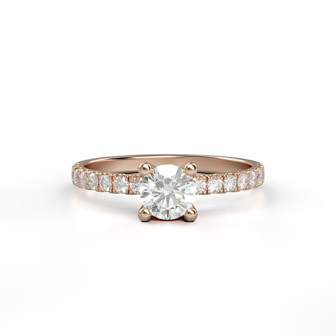 Klassischer Verlobungsring Daniela mit 0.70 ct TW/VVS-Diamant in 4-Krappen-Fassung und 0.25 ct G/VS-Diamanten an der Ringschiene – erhältlich in München und Augsburg

