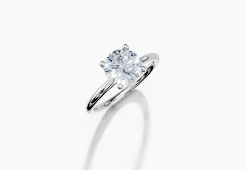 Platinum Round 1.5 Carat G/H SI Plain Plain 4Pr Diamond Ring