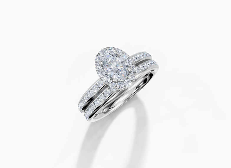 Platinum Oval 0.5 Carat G/H SI Plain Channel Single Halo Diamond Ring