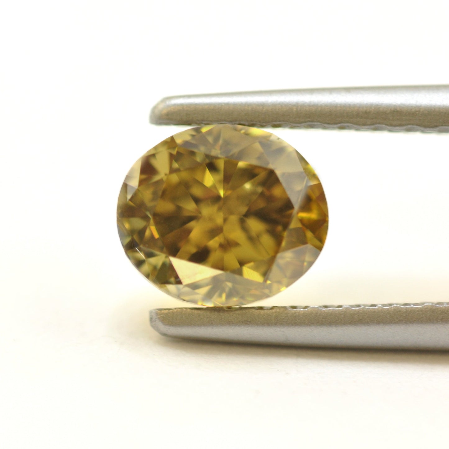 0,76 Karat Fancy Deep Brownish Greenish Yellow Oval Diamond (SI1) GIA