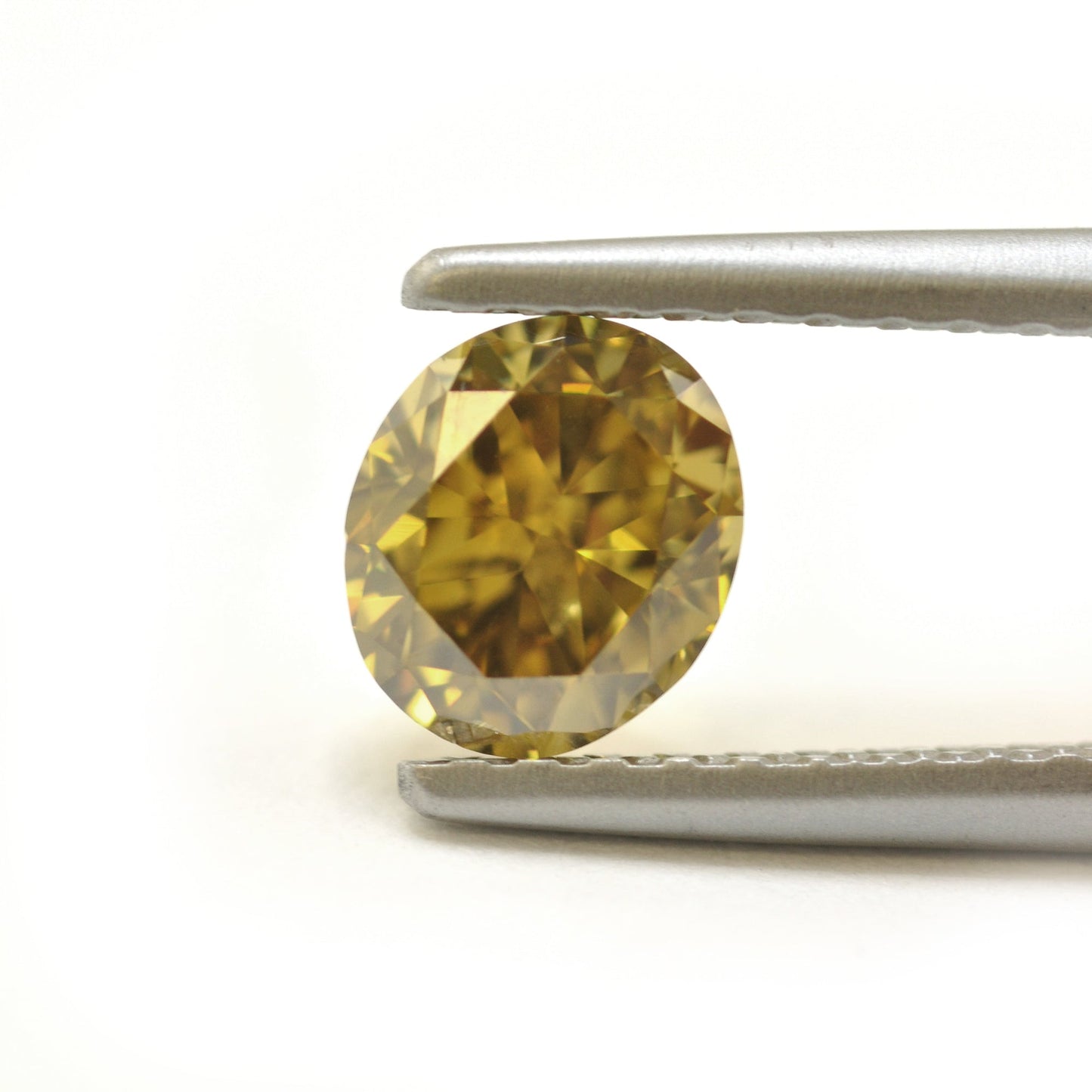 0,76 Karat Fancy Deep Brownish Greenish Yellow Oval Diamond (SI1) GIA