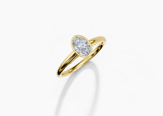 18K Oval 0.3 Carat G/H SI Cathedral Plain Bezel Diamond Ring