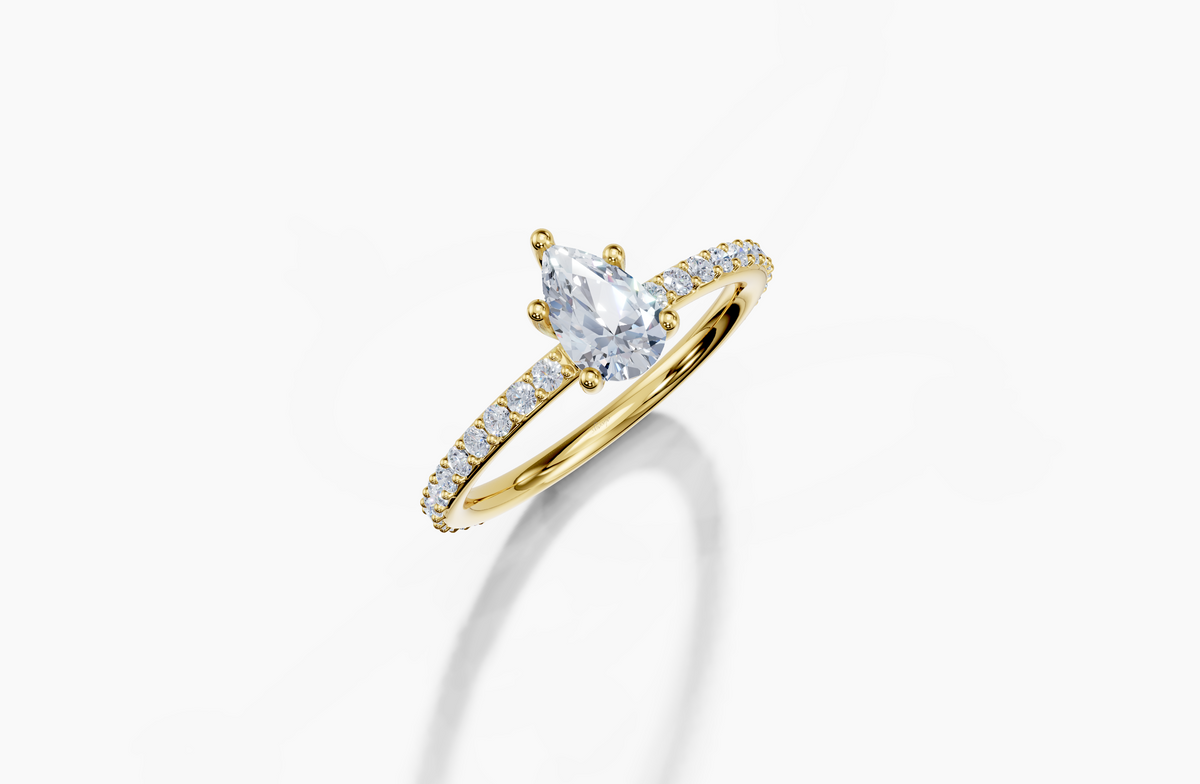 18K Pear 0.5 Carat D/E/F VS/VVS Plain Plate Prong 4Pr Diamond Ring