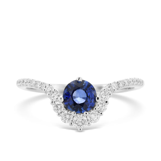Ring mit blauem, rundem Saphir und Diamant-Halo