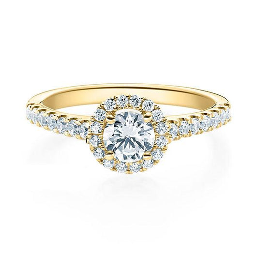 Verlobungsring Ruby mit 0.70ct Diamant G/VS, umrahmt von 0.39ct Diamanten im French-Pavé-Halo, designed für perfekte Kombinierbarkeit – erhältlich in München & Augsburg.
